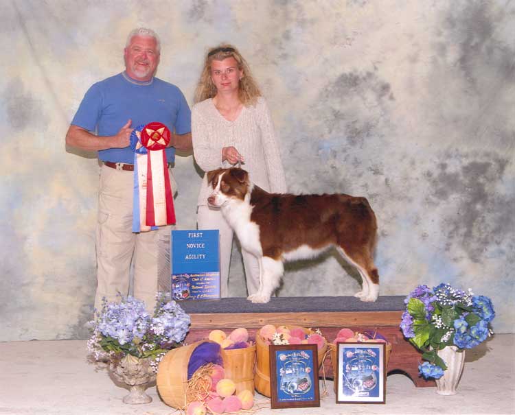 ASCA Judge Richard Pittmann and Ribbons which Trey won at ASCA Nationals Agility Trial 05